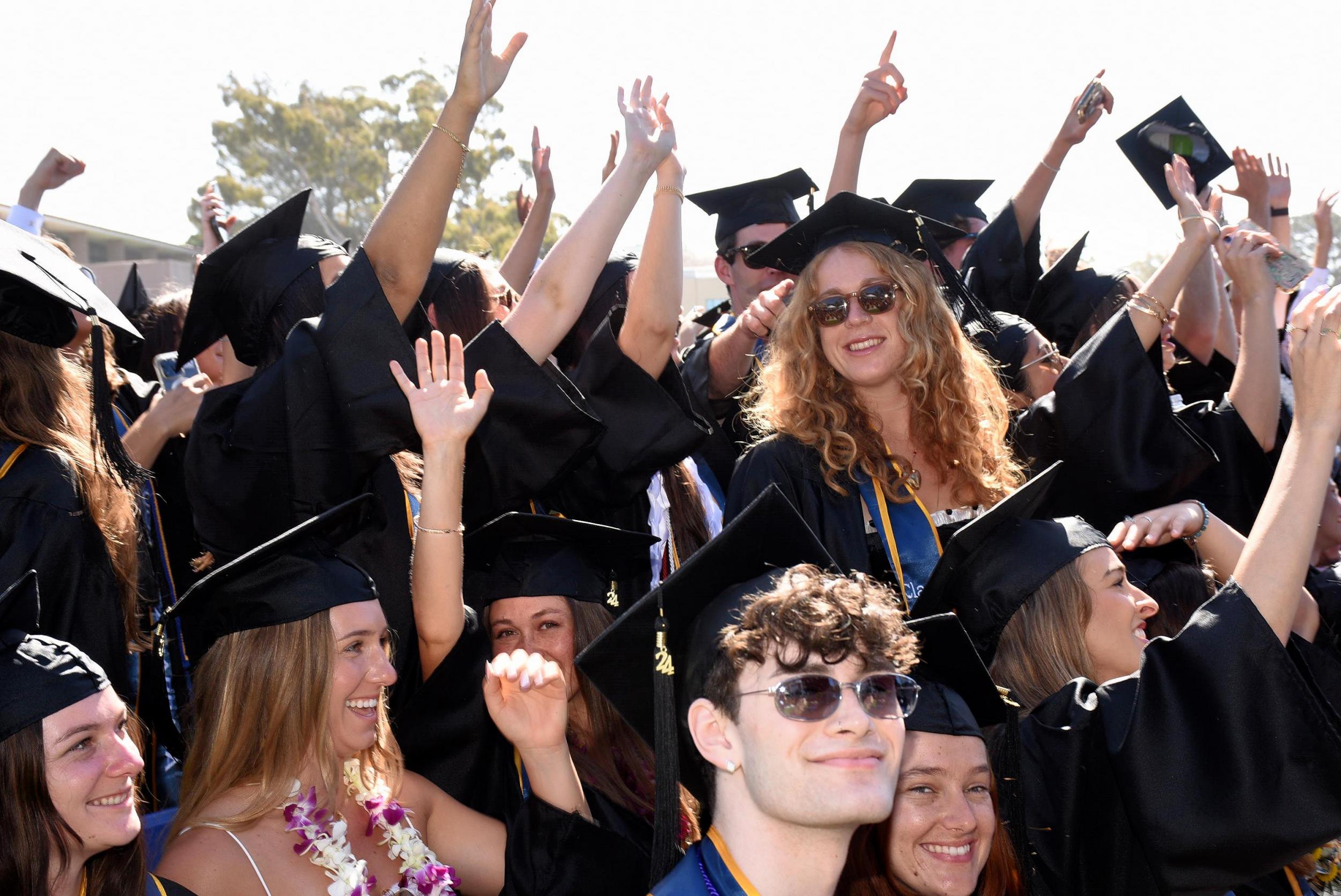 Students celebrating graduation